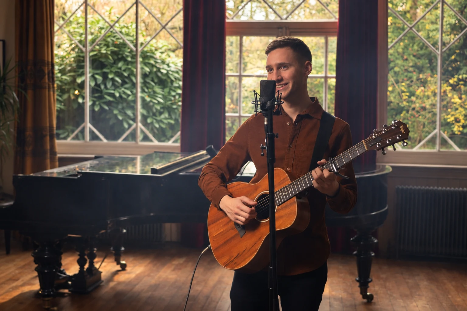 Guests singing along while Agustin Kafka performs at a private party